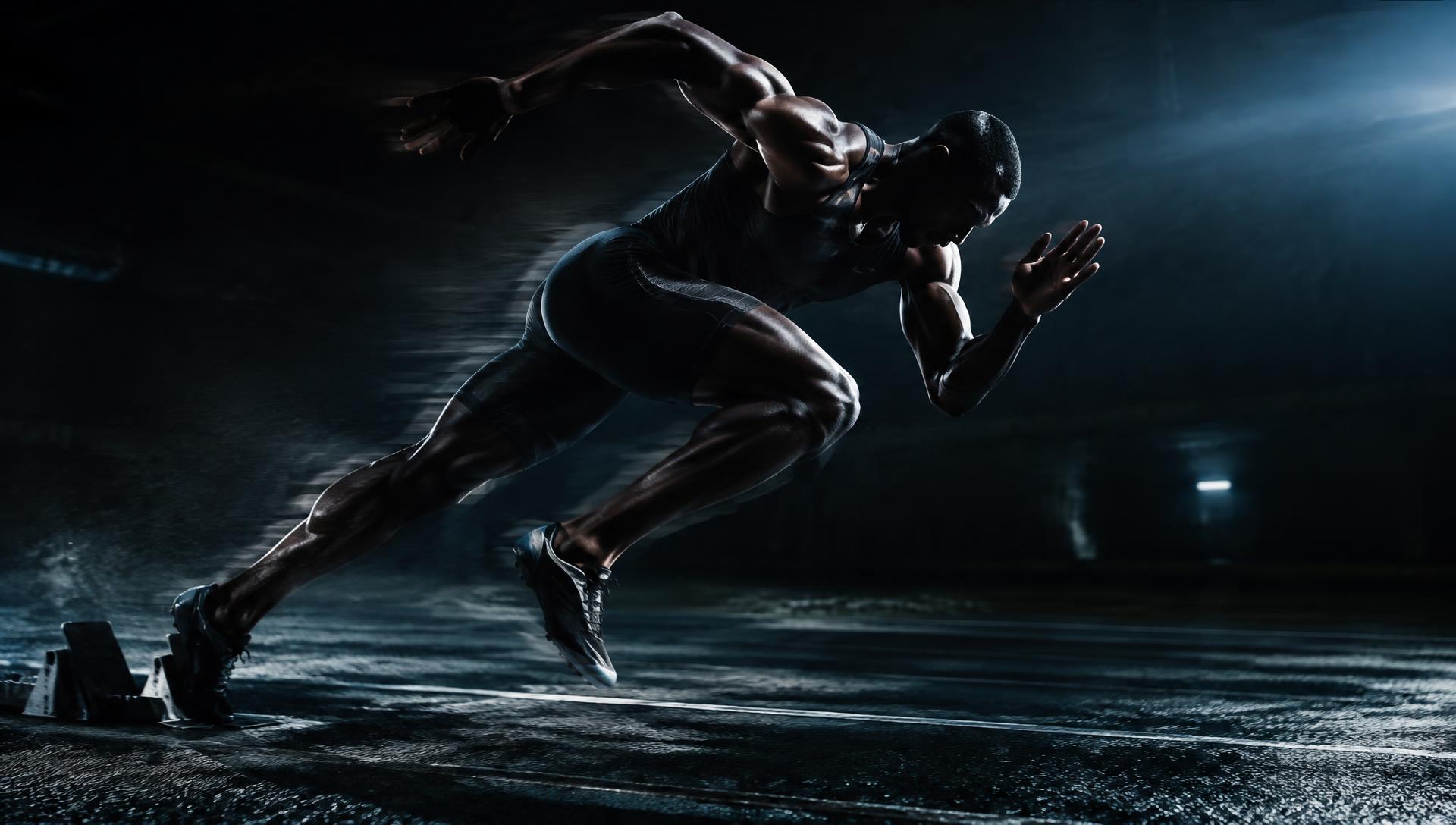 Sprinter driving out of the starting blocks